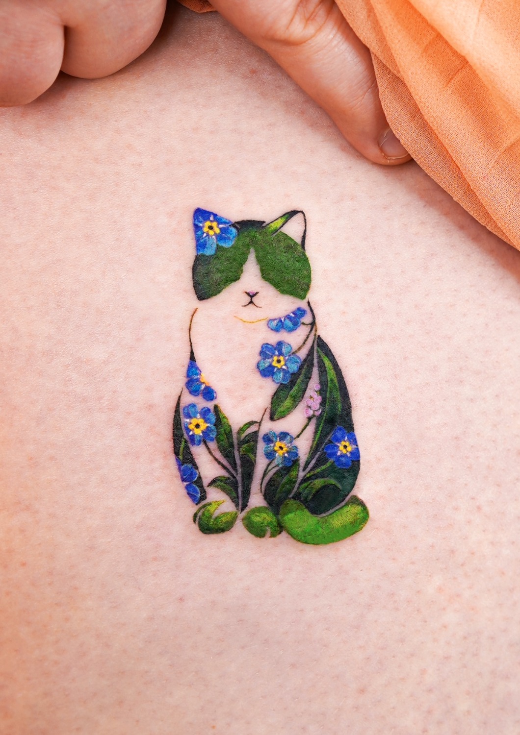 Cat miniature tattoo