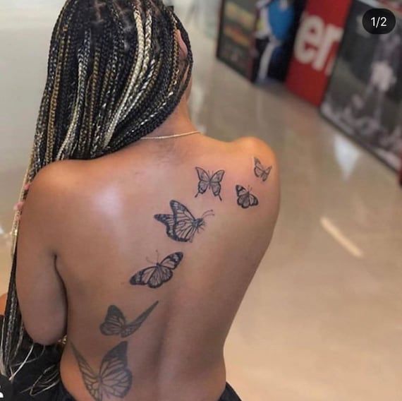 20 Cute Butterfly Tattoos On Back For Women Butterfly tattoos for women Butterfly tattoo on shoulder Butterfly back tattoo