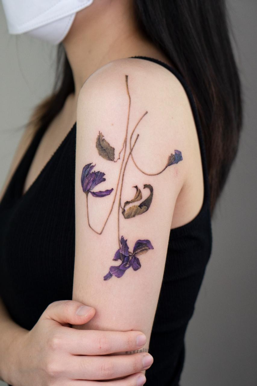 Flower tattoo by Pokhy