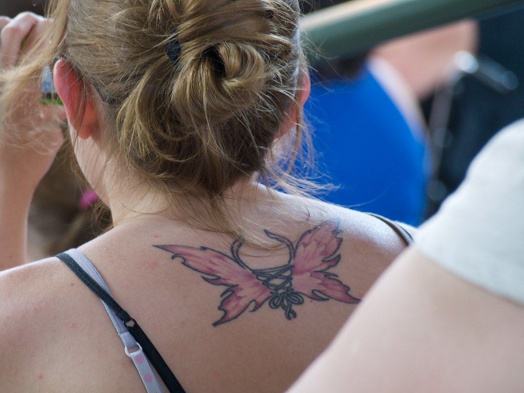 23 Awesome Upper Back Tattoos for Women Butterfly tattoos for women Butterfly tattoo designs Butterfly tattoo