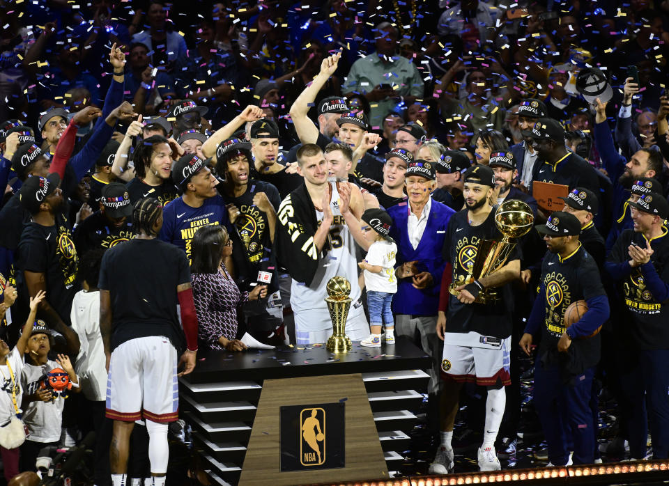 Nikola Jokić and the Denver Nuggets celebrate after defeating the Miami Heat to win the 2023 NBA championship at Ball Arena in Denver, on June 12, 2023. (Photo by Andy Cross/MediaNews Group/The Denver Post via Getty Images)