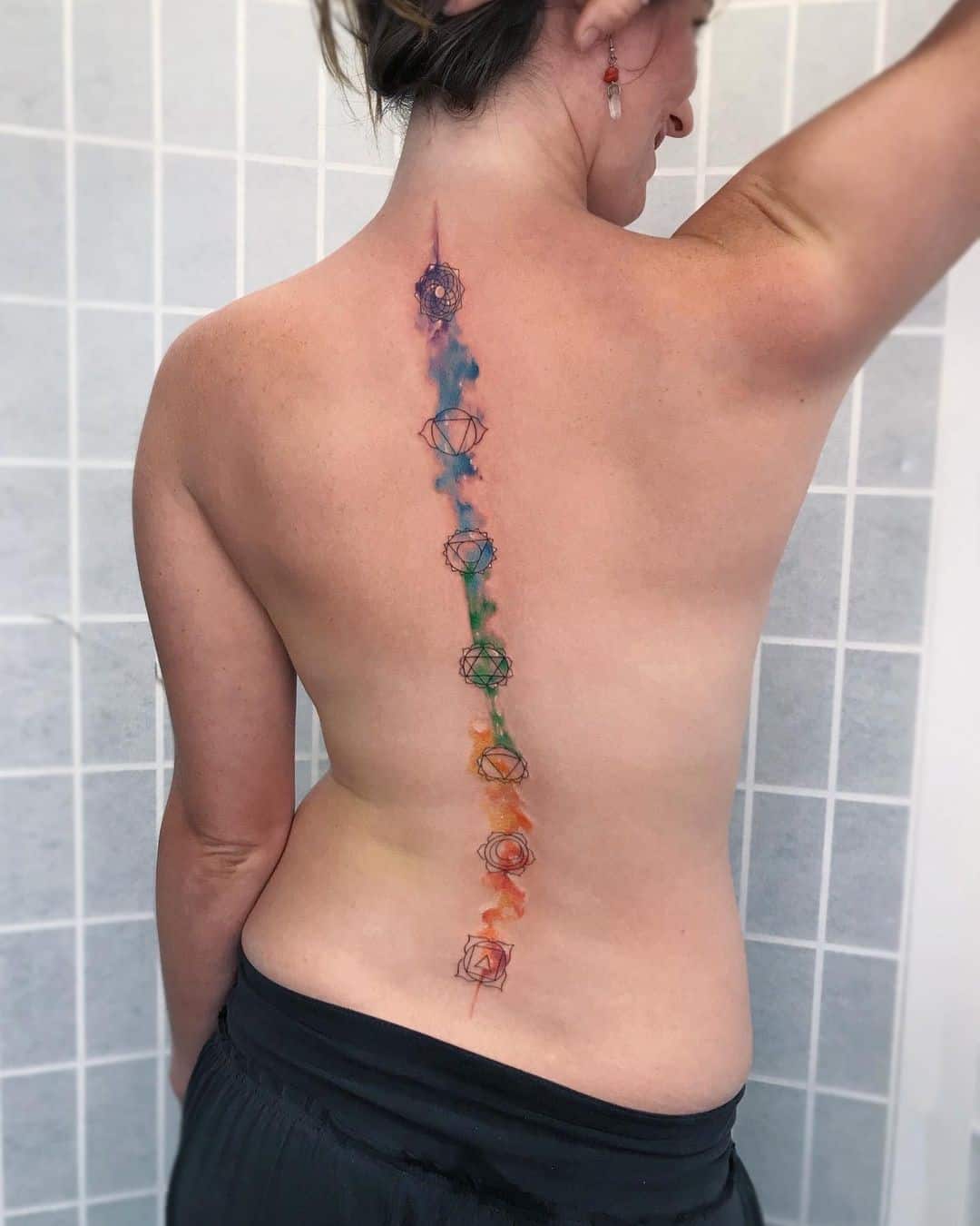 Bright Colorful Chakra Inspired Spine Tattoo