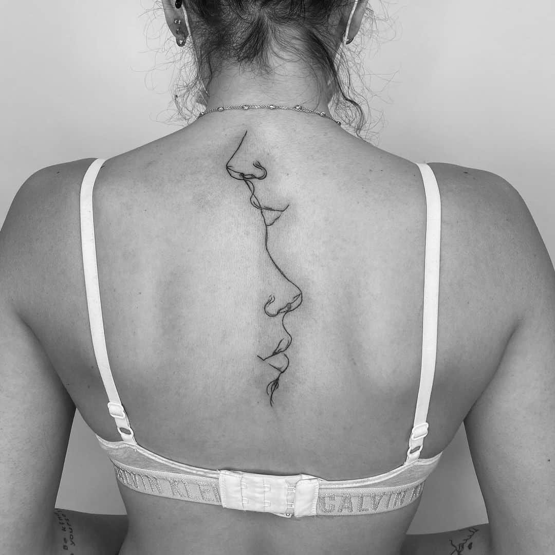 Feminine Artsy Spine Tattoo