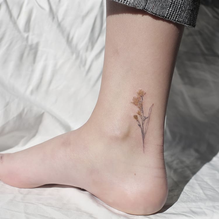 Freesia tattoo by tattooist_chai