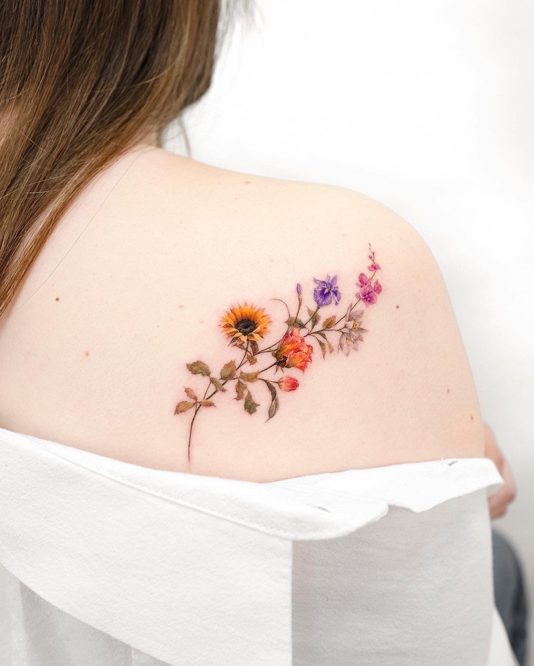 Flowers tattoo done by Dong Hwa Kim