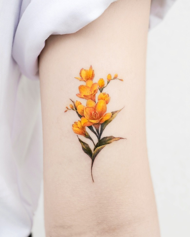 Flowers tattoo done by Dong Hwa Kim