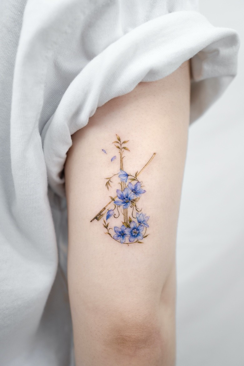 Flowers tattoo done by Dong Hwa Kim