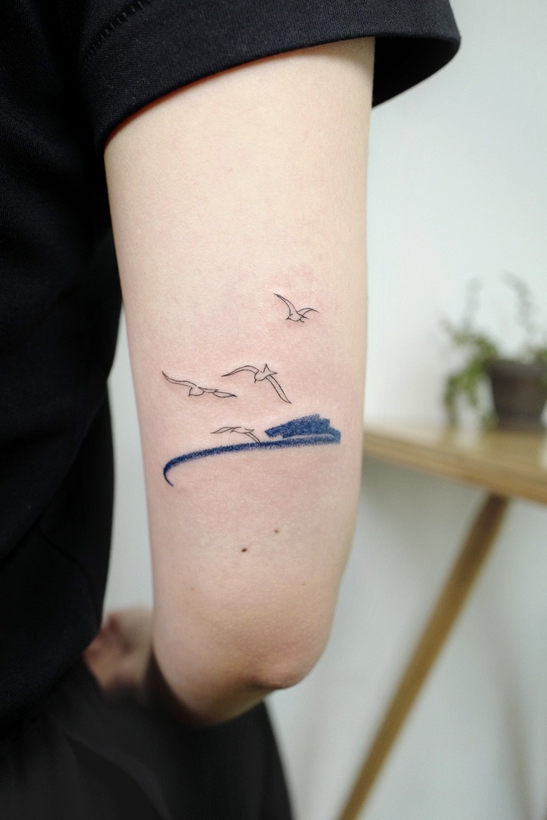 fine line minimalistic tattoo by Joo Joo