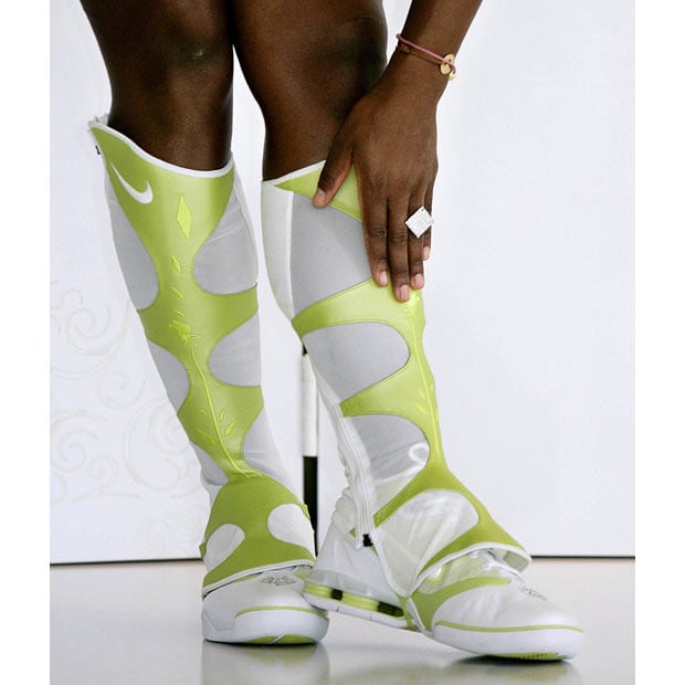U.S. tennis star Serena Williams shows off her new leg warmer boots at a media launch in Melbourne, Australia, Thursday, Jan. 13, 2005