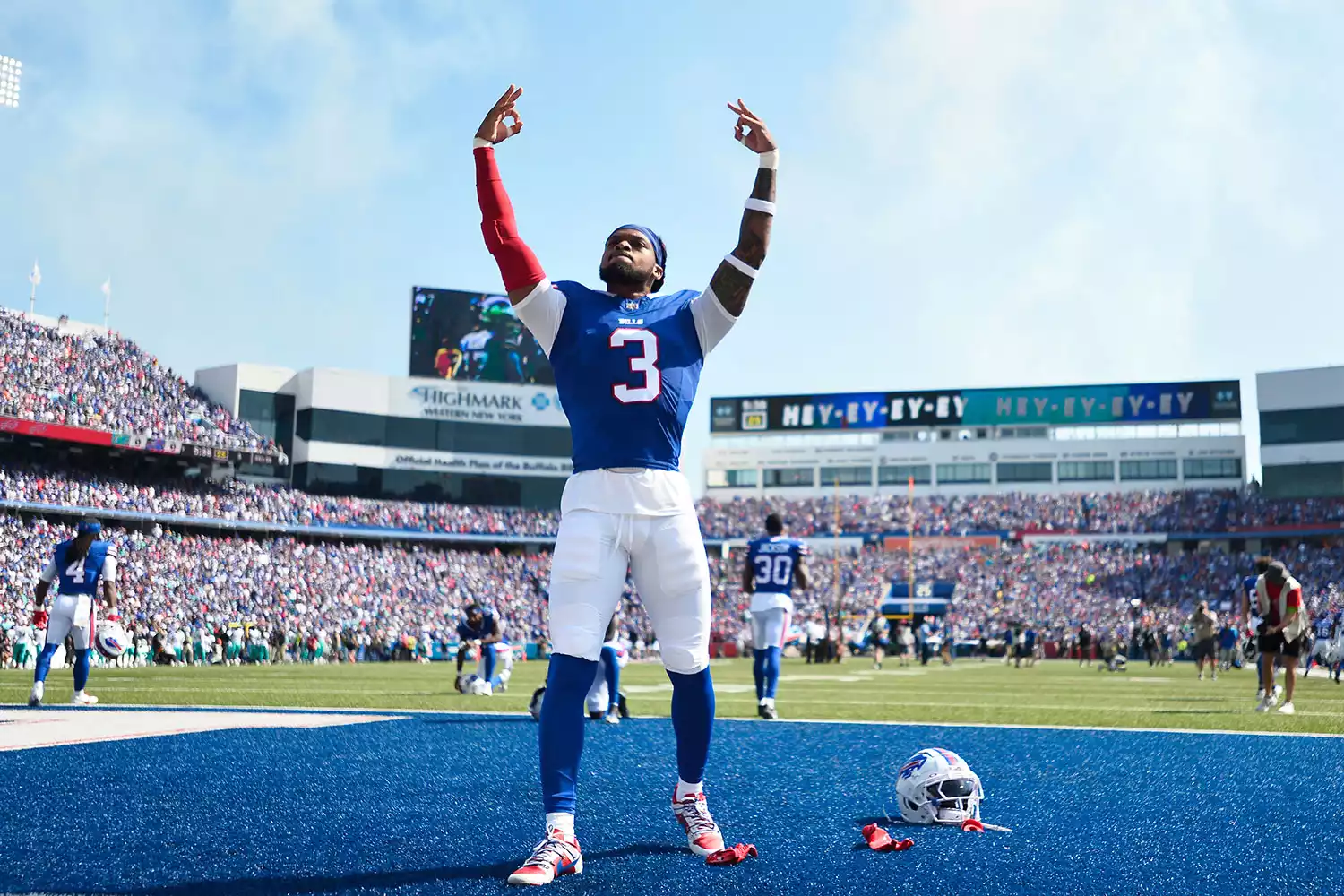 Buffalo Bills safety Damar Hamlin (3) raises his arms while warming up prior to an NFL football game against the Miami Dolphins, Sunday, Oct. 1, 2023, in Orchard Park, N.Y.