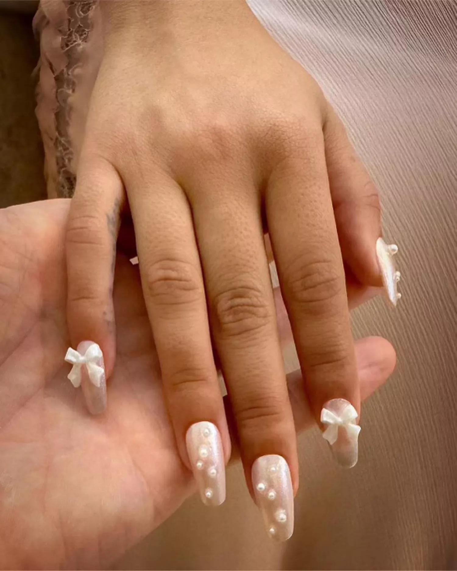 Bow nails on Camila Cabello by Tom Bachik.