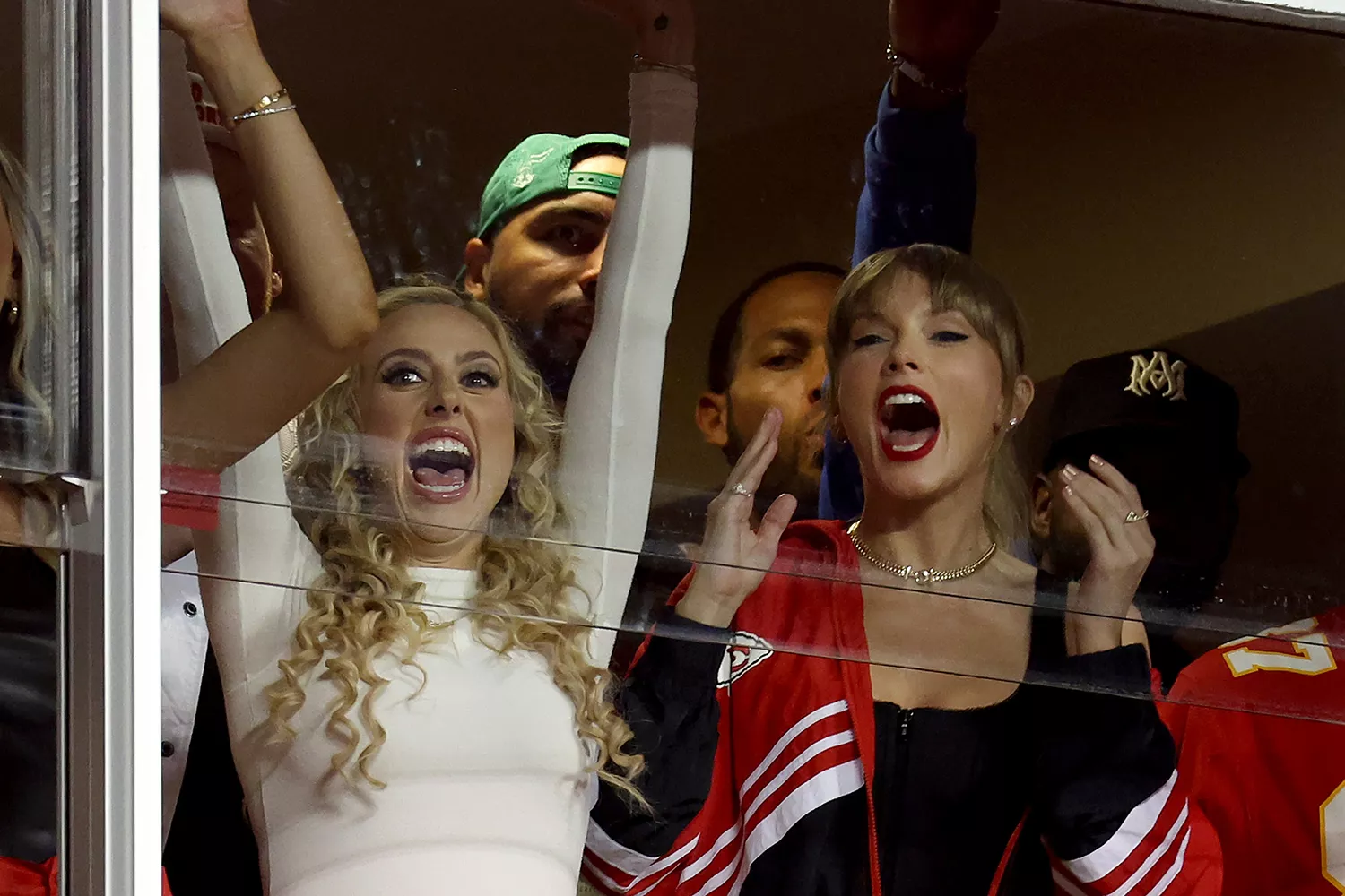 Brittany Mahomes and Taylor Swift celebrate a touchdown by the Kansas City Chiefs against the Denver Broncos