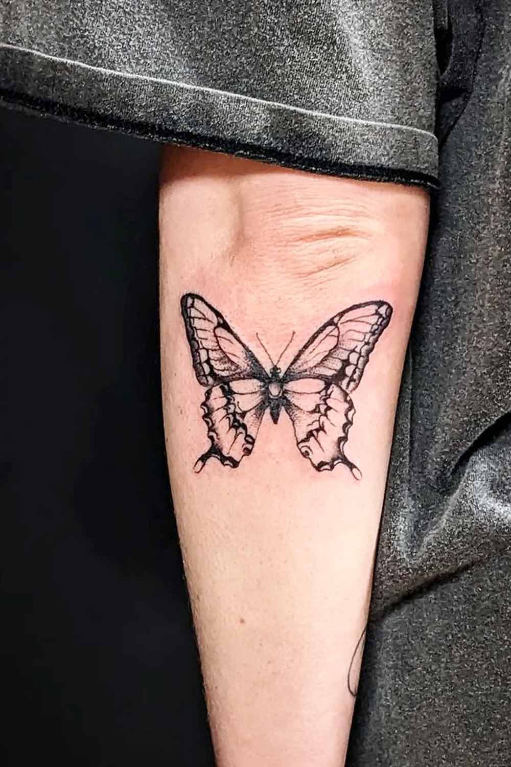 Black and White Butterfly on Arm