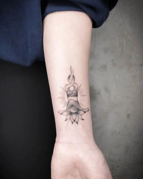black and grey lotus yoga forearm tattoo by @cktattooz