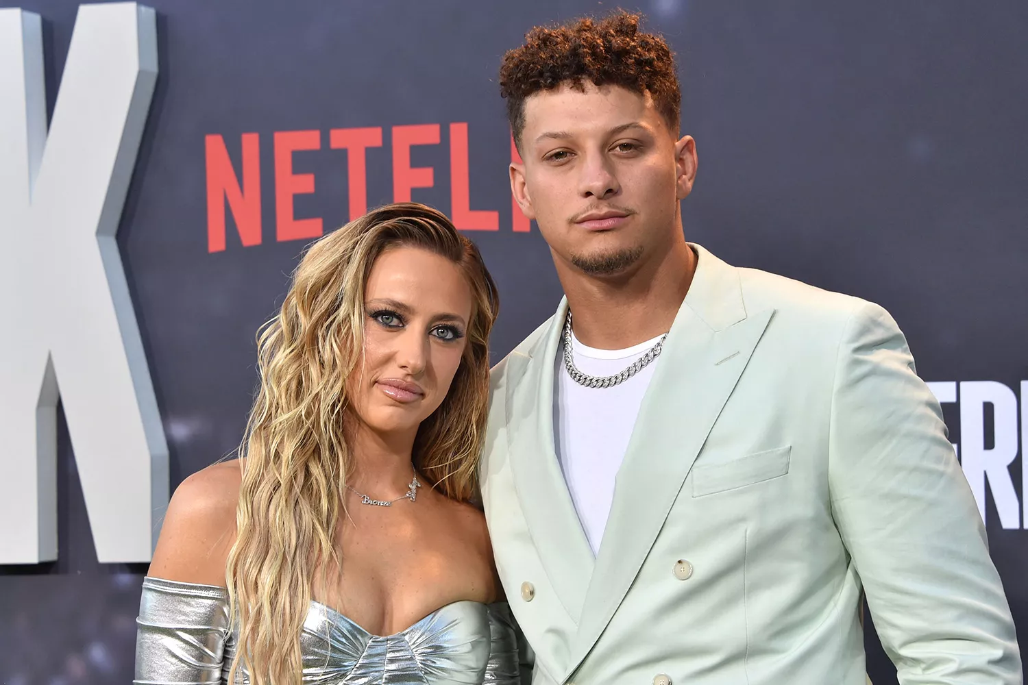 Patrick Mahomes and his wife Brittany Mahomes arrive for the premiere of Netflix's docuseries "Quarterback" 