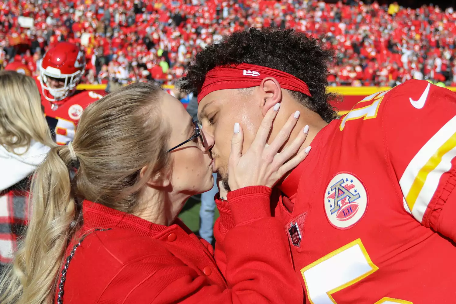 Kansas City Chiefs quarterback Patrick Mahomes (15) kisses fiancÃ©e Brittany Matthews before an NFL game between the Las Vegas Raiders and Kansas City Chiefs on Dec 12, 2021 at GEHA Field at Arrowhead Stadium in Kansas City, MO