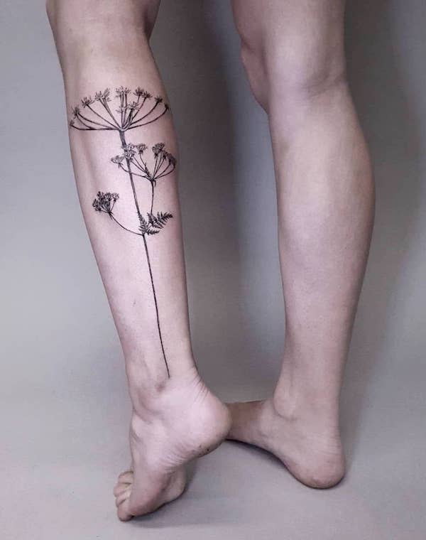 Cow parsley calf tattoo by @lionoflauratattoos