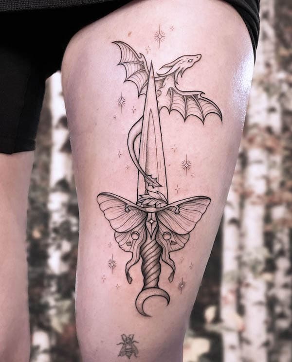 Dragon dagger thigh tattoo by @uprooted_ink