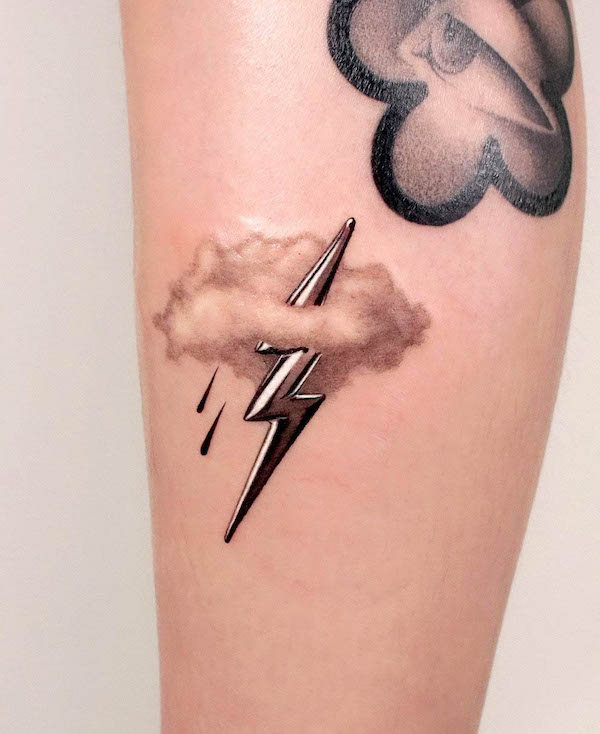 Monochrome lightning and clouds tattoo by @shooin.tattoo