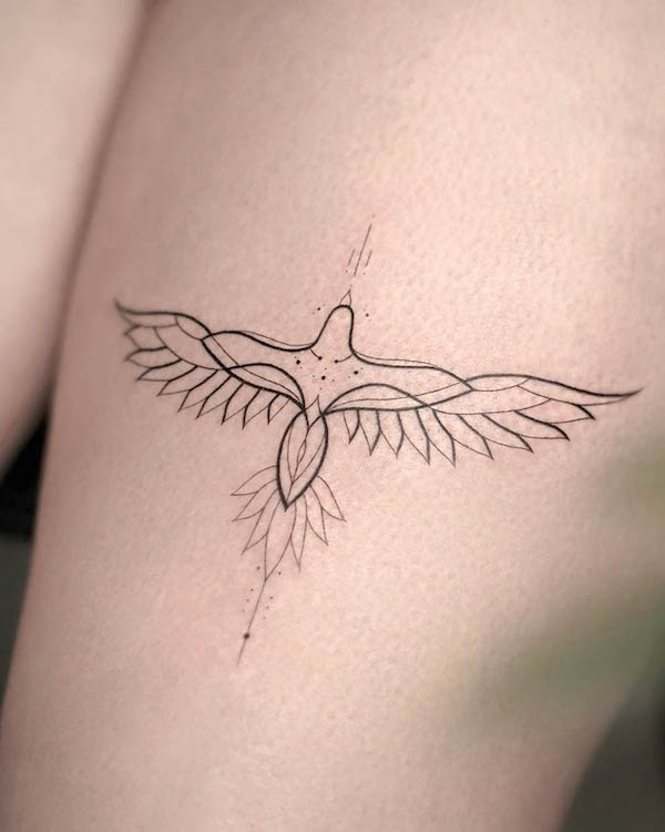 Small bird symbol thigh tattoo by @audreyanne_tattoo