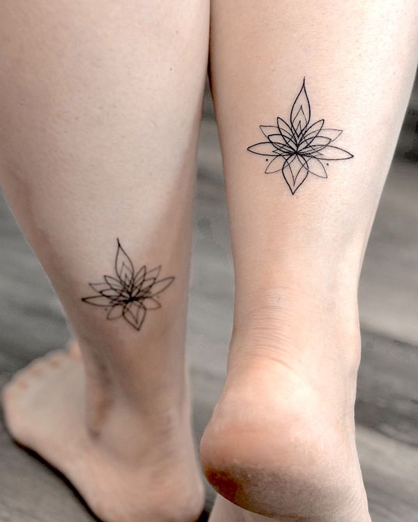 Small lotus symbol leg tattoos for women by @kristinevodon
