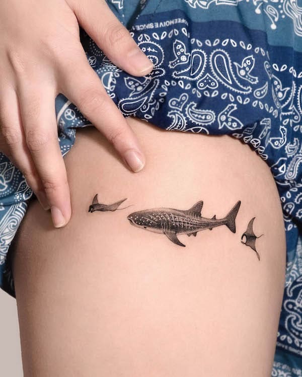 Small shark upper thigh tattoo for women by @choiyun_tattoo
