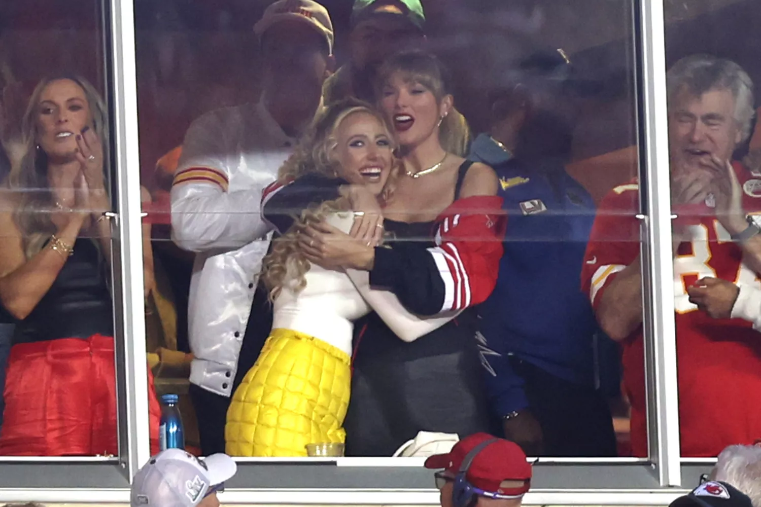 Lyndsay Bell, Brittany Mahomes and Taylor Swift celebrate during the first half of the game between the Kansas City Chiefs and the Denver Broncos