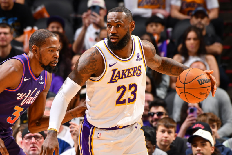 PHOENIX, AZ - FEBRUARY 25: LeBron James #23 of the Los Angeles Lakers looks on during the game against the Phoenix Suns on February 25, 2024 at Footprint Center in Phoenix, Arizona. NOTE TO USER: User expressly acknowledges and agrees that, by downloading and or using this photograph, user is consenting to the terms and conditions of the Getty Images License Agreement. Mandatory Copyright Notice: Copyright 2024 NBAE (Photo by Barry Gossage/NBAE via Getty Images)