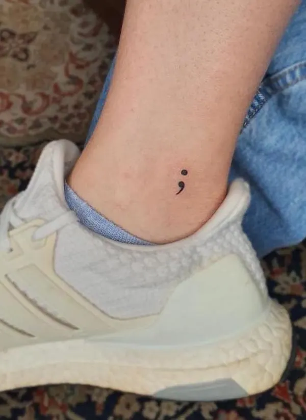 Meaningful semicolon ankle tattoo by @eric.artetattoo