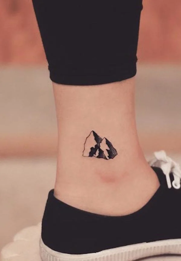 Mountain ankle tattoo by @tattoo_grain