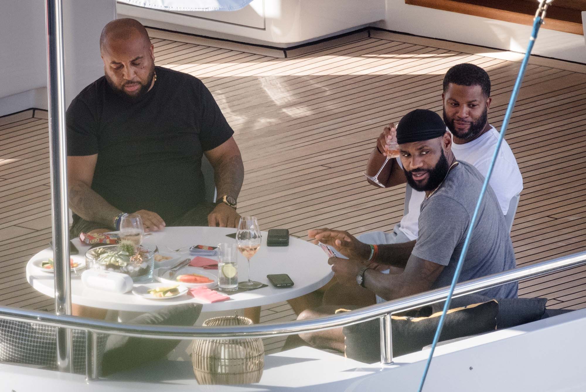 LeBron James plays UNO with friends on a yacht.