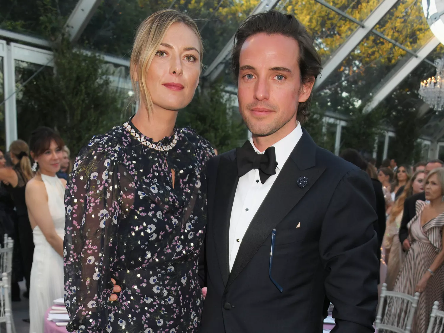 Maria Sharapova (L) and Alexander Gilkes attend the Argento Ball for the Elton John AIDS Foundation in 2018