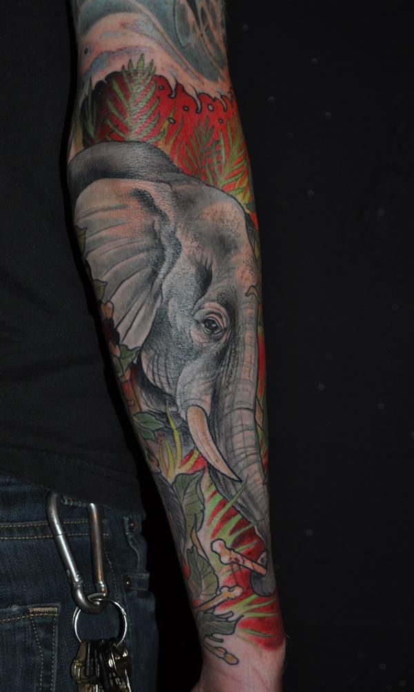 Elephant head arm tattoo