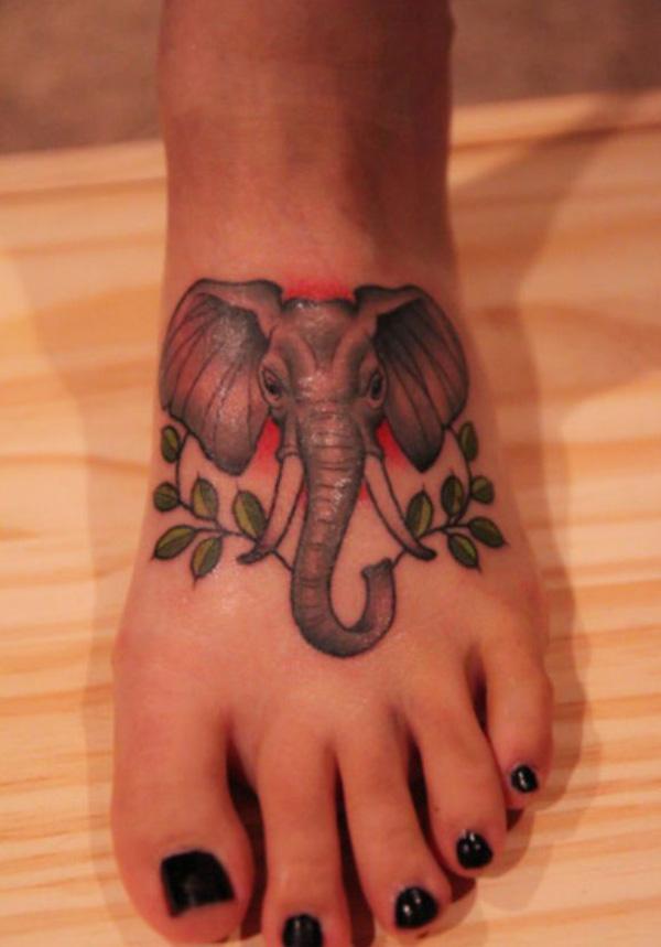 Cute Elephant head with vines foot tattoo