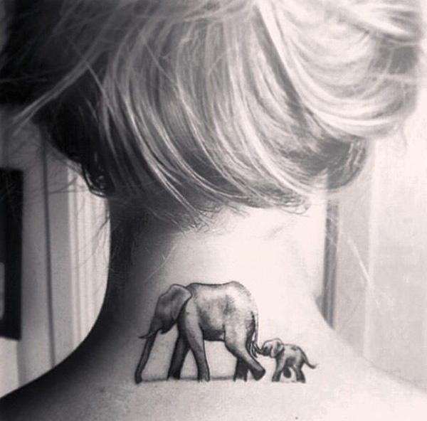 Motherhood elephant family tattoo on neck