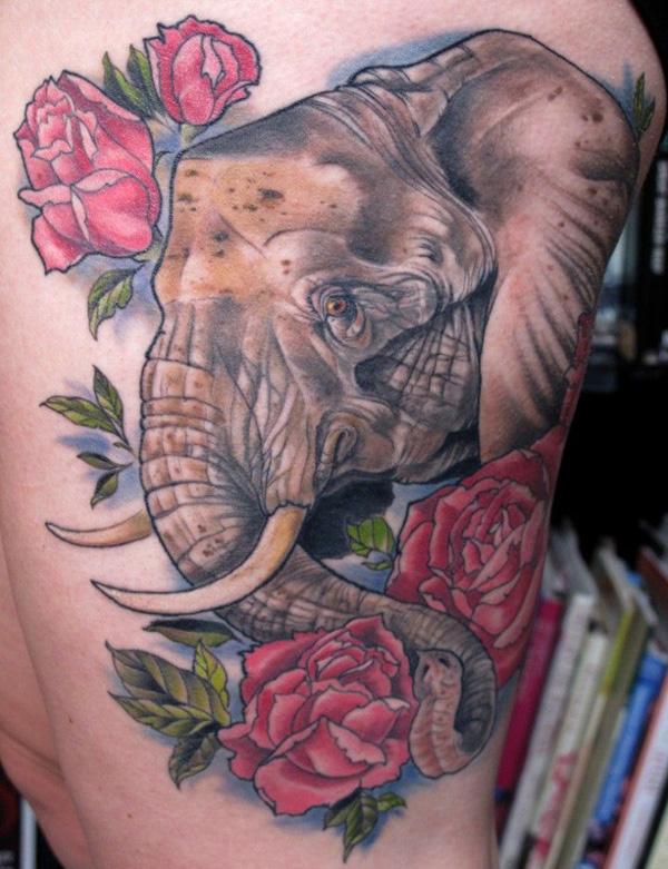 Elephant and rose flowers tattoo