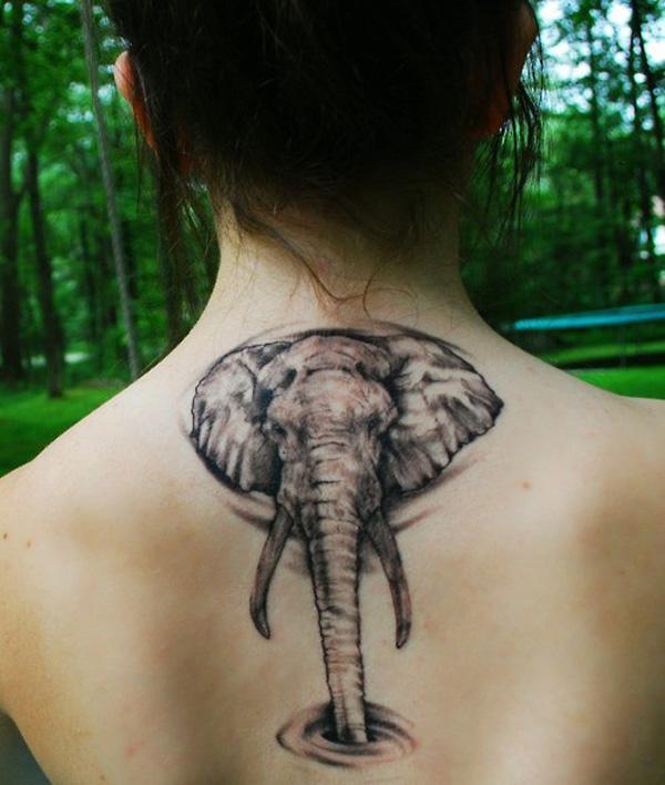 An elephant sucking water back tattoo