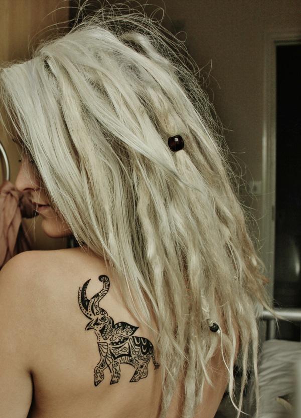 Small tribal elephant tattoo for womeno