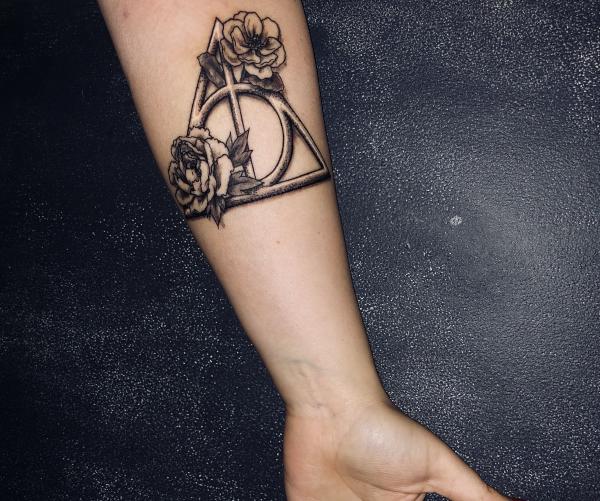 3D deathly hallows with flower tattoo