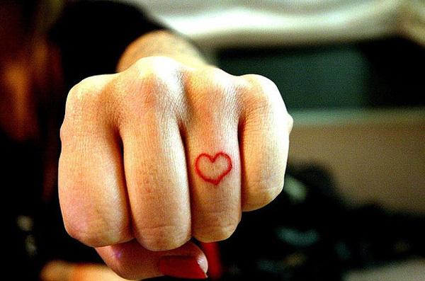 Red Heart Symbol Tattoo On Finger