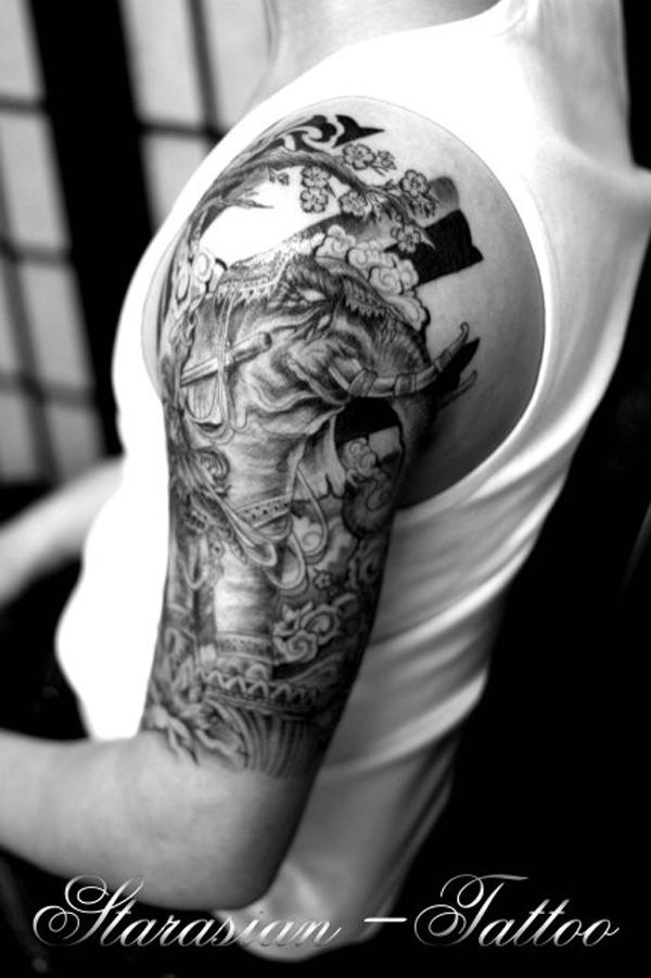 Decorated elephant sleeve tattoo in black and white style