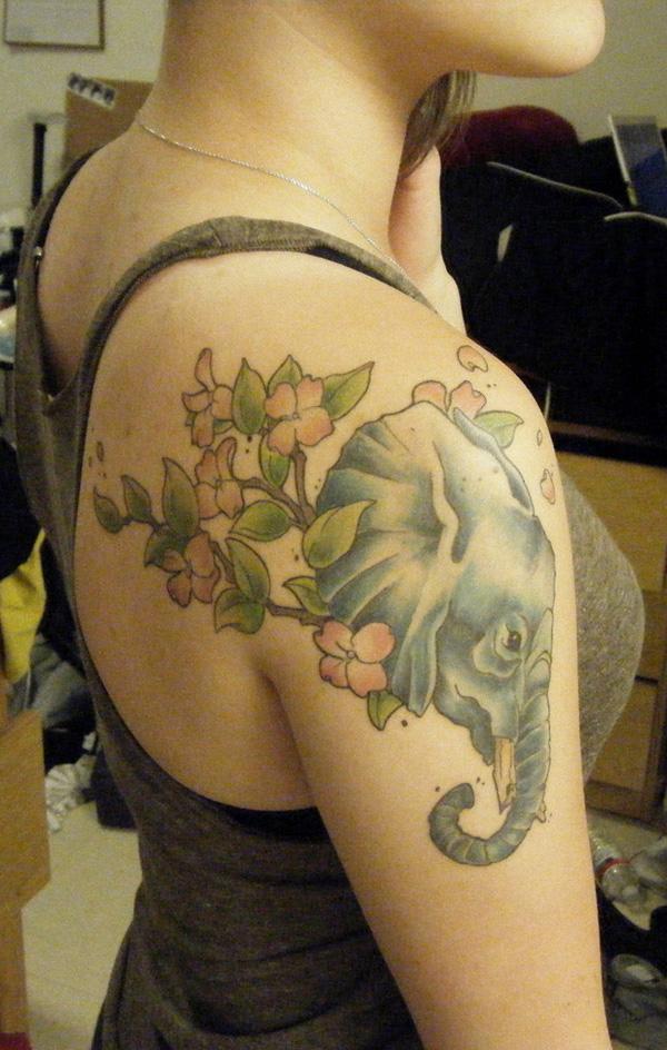 Colored elephant head and flowers shoulder tattoo