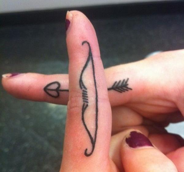 Sagittarius Bow and Arrow Finger Tattoo
