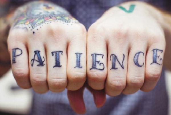 Patience lettering finger Tattoo