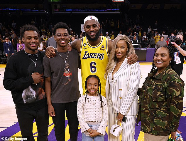 The James' posing for a family photo after LeBron became the NBA's all-time leading scorer