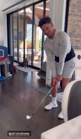 <p>Patrick Mahomes/Instagram</p> Patrick Mahomes tried out his new golf club in the couple's kitchen
