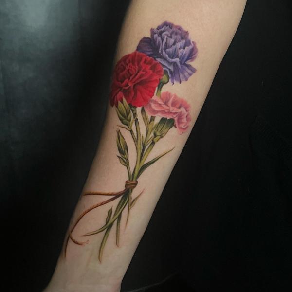 A bouquet of carnation flowers tattoo