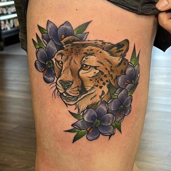 A tiger head encircled with violet flowers