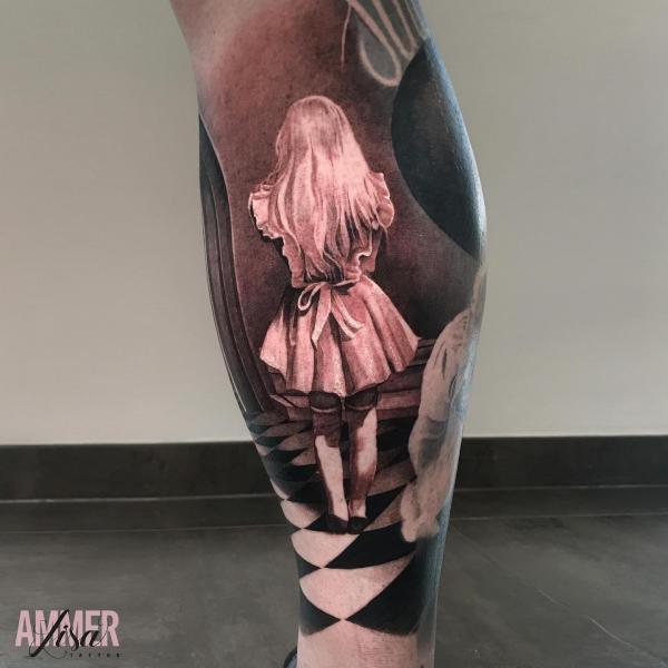 Alice calf tattoo