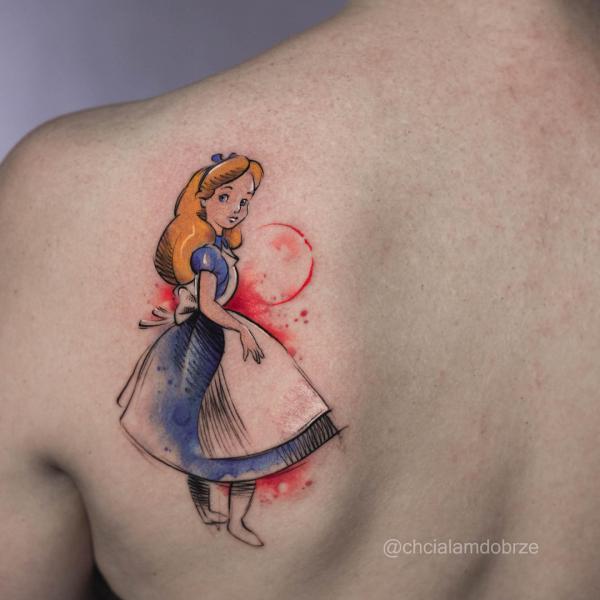 Alice shoulder blade tattoo